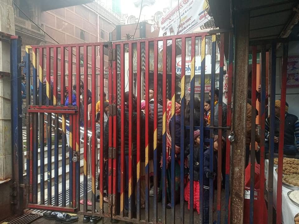 Locals protest the installation of iron Barricades